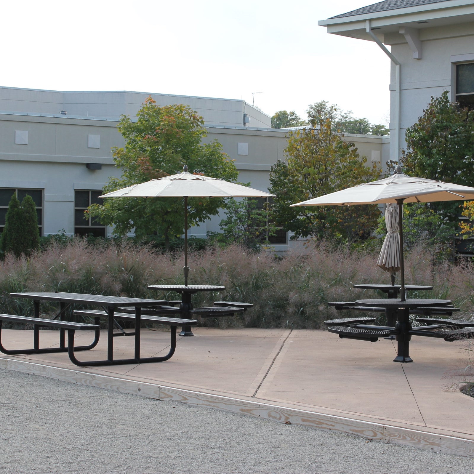 Wabash Valley picnic tables and umbrellas in front of a church