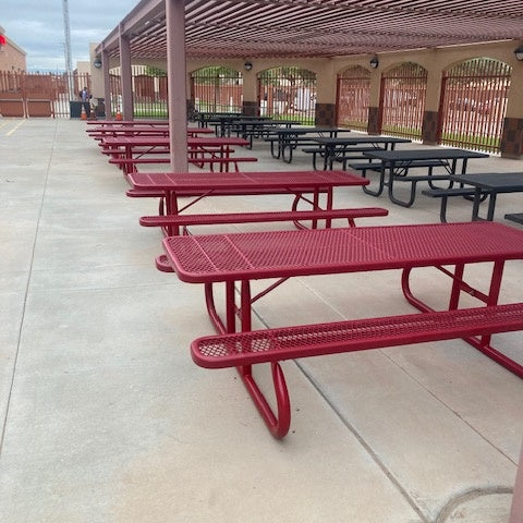 Rows of wabash valley picnic tables at a school outdoor cafeteria